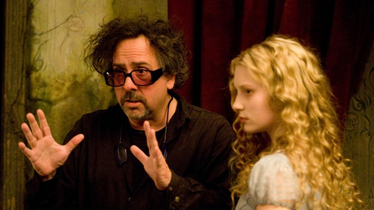 Tim Burton directing Mia Wasikowska in Alice in Wonderland (2010)