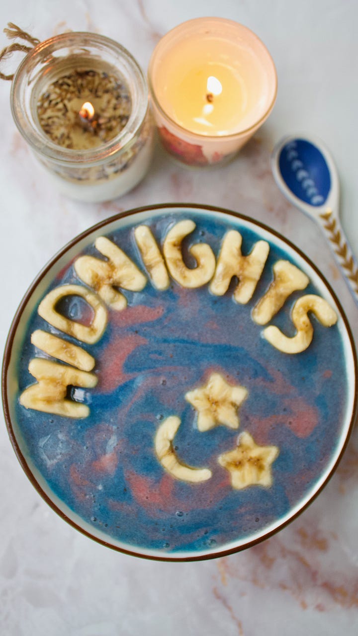 two photos of a Midnights themed smoothie bowl, of blue and red swirls and banana letters on top.