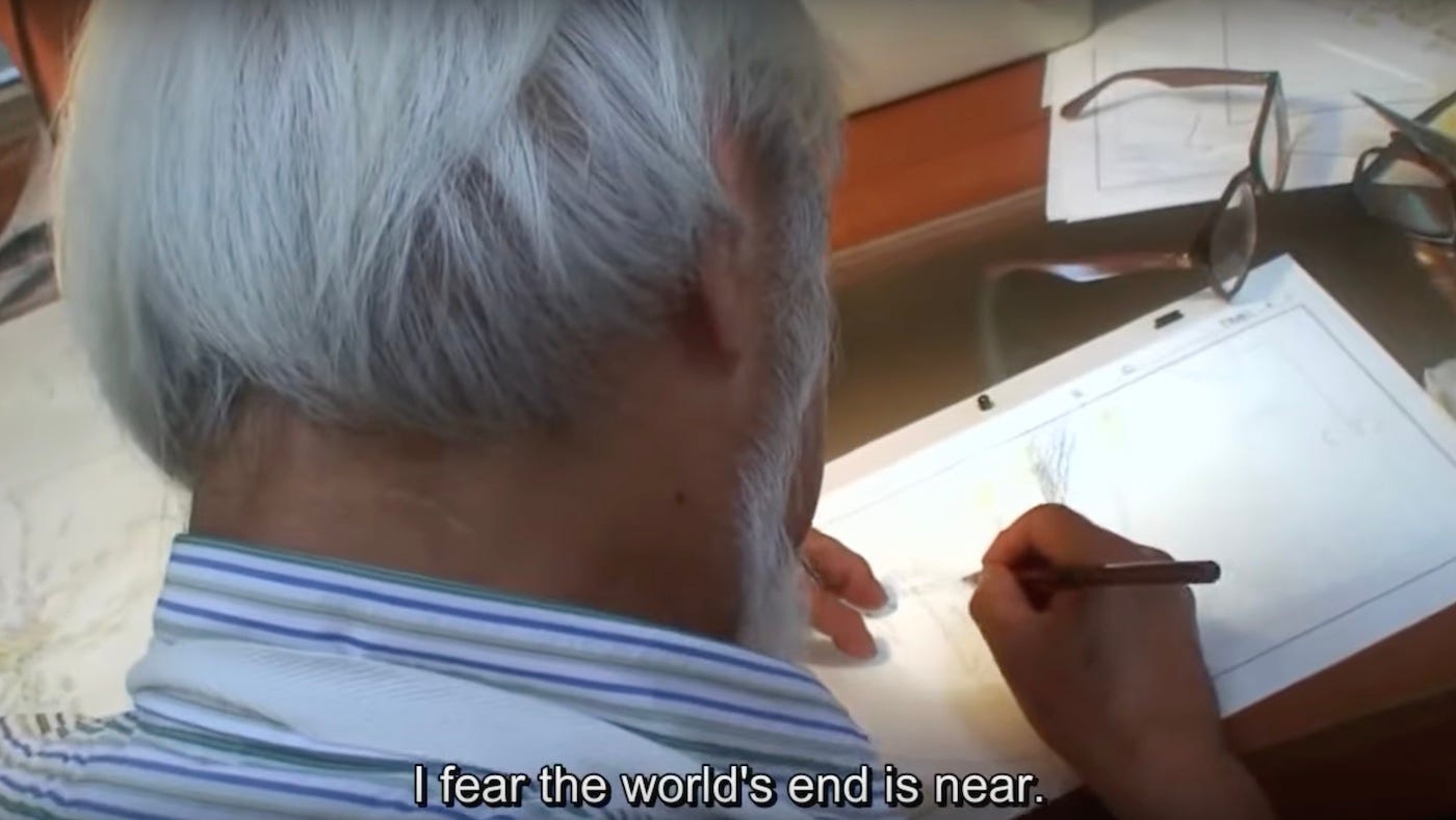 Miyazaki is viewed from behind as he draws and says, "I fear the world's end is near."