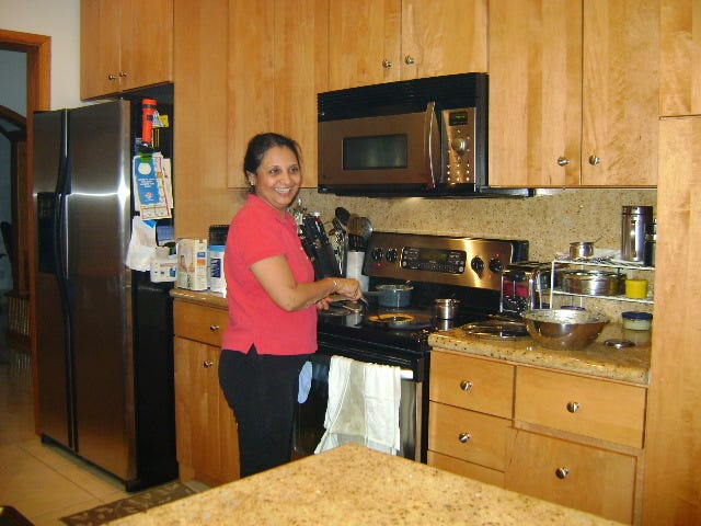Hansa making something wonderful that she will serve with ghee!!!