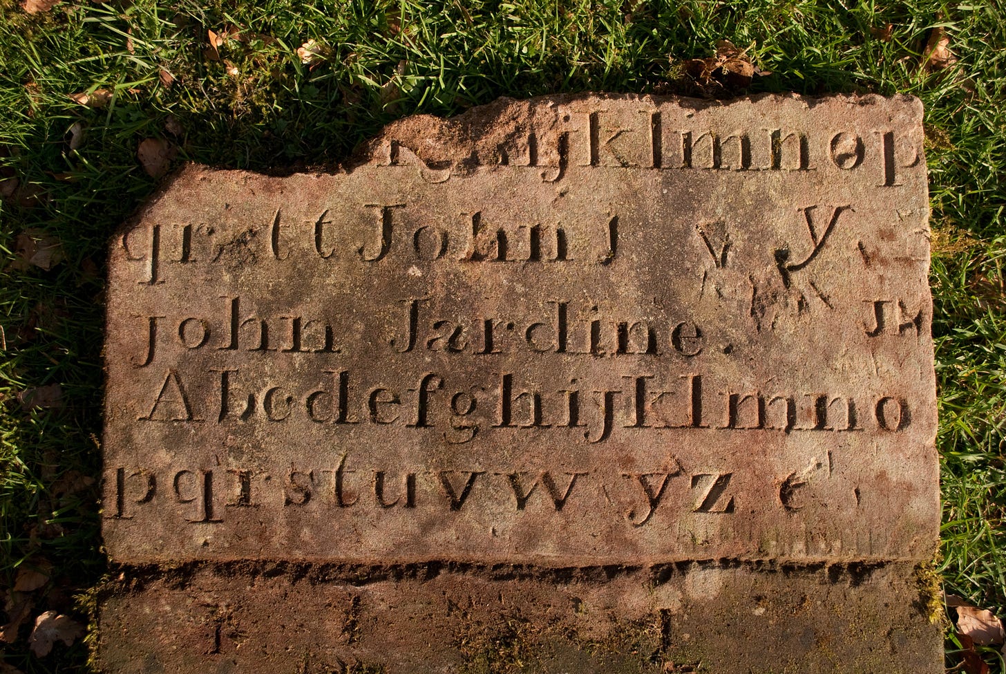 lettering carved in stone