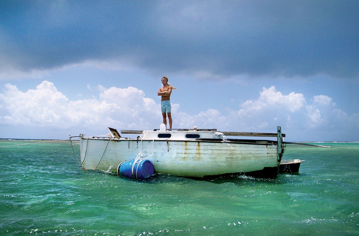 Thomas Tangvald aboard the remains of Melody, at anchor off Culebra, four years after he sailed her there nonstop from Great Britain 
