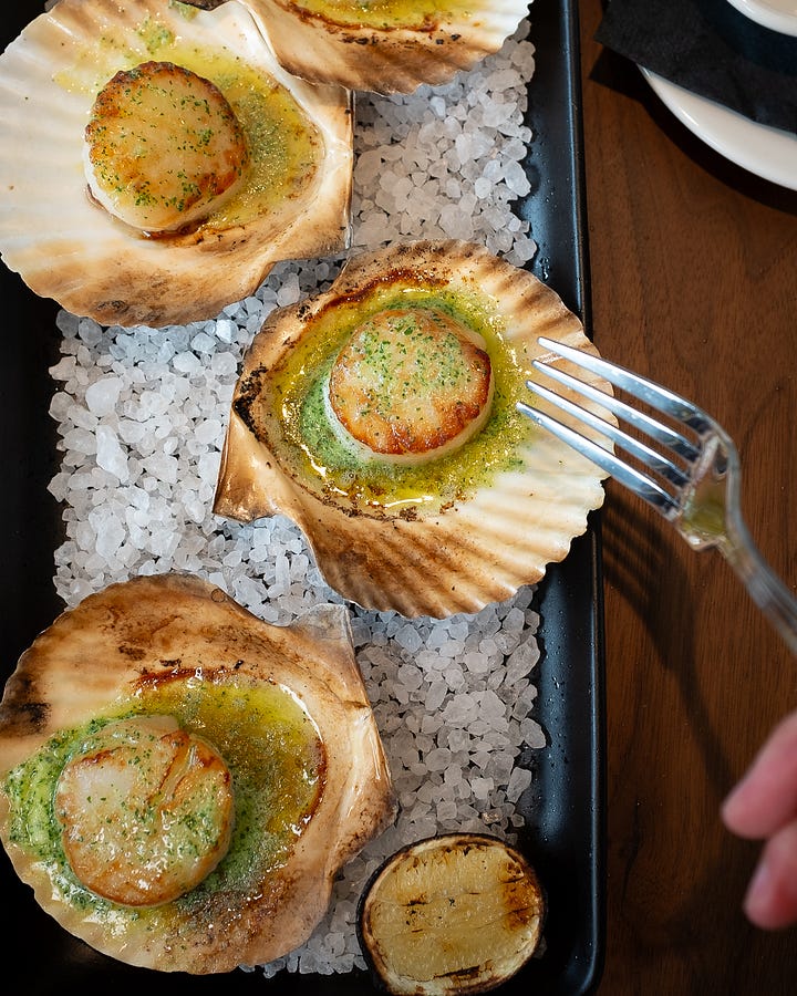 Photos of interior of Broadway 10 Bar & Chophouse and scallop dish