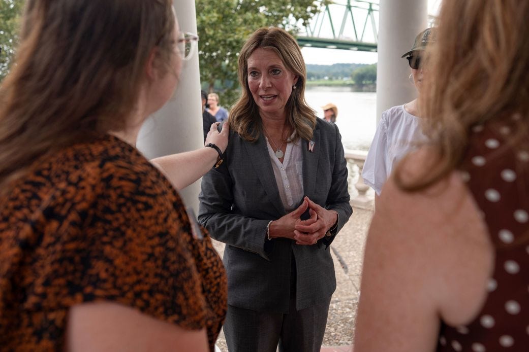 Democratic gubernatorial candidate Dr. Amy Acton speaks with supporters during a campaign event along the Ohio River, in Marietta, Ohio, on September 17.