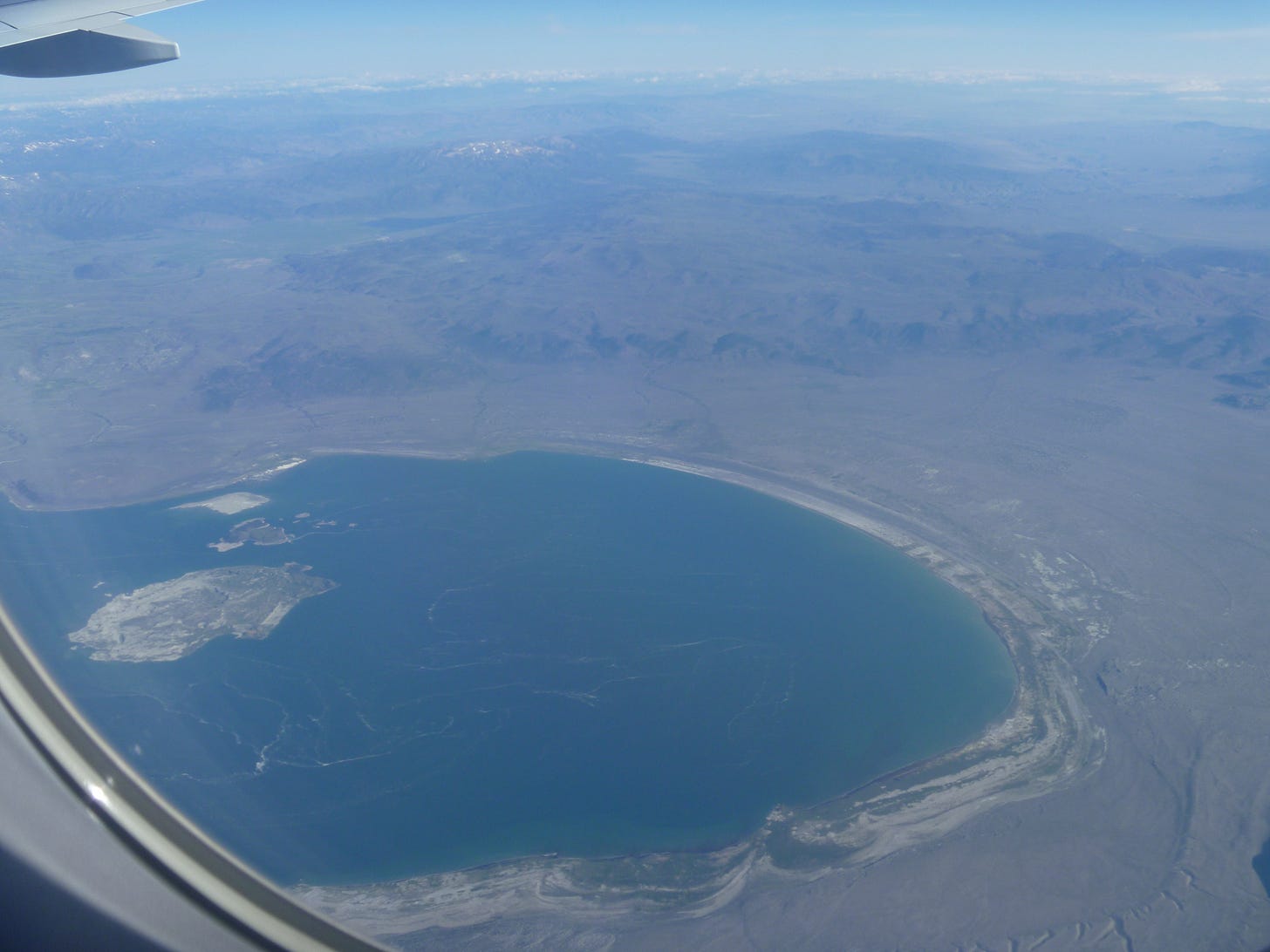 An image I took while flying to San Francisco. I think this is somewhere in the Sierra Nevadas.