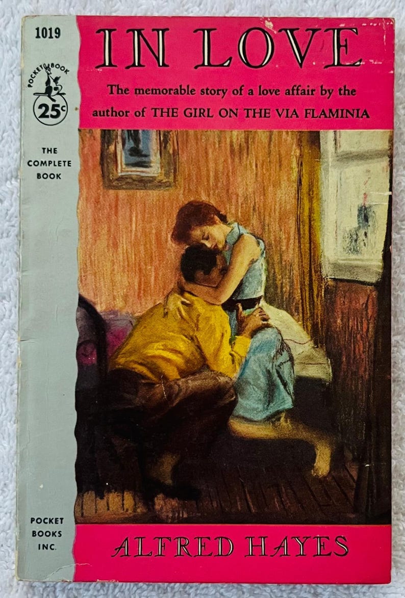 May include: Vintage paperback book cover titled "IN LOVE" with a pink banner and illustration of a couple embracing. The author's name, Alfred Hayes, is at the bottom. The cover also includes the text "The memorable story of a love affair". May include: Vintage paperback book cover titled "IN LOVE" with a pink banner and illustration of a couple embracing. The author's name, Alfred Hayes, is at the bottom. The cover also includes the text "The memorable story of a love affair".