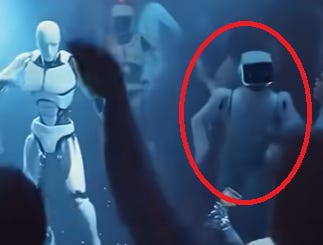 Faceless robot with a more square-shaped body shown next to the malebot with a more anatomically correct physique.