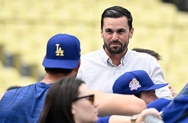 Los Angeles, CA General manager Brandon Gomes of the the Los Angeles Dodgers speaks with Clayton Kershaw prior to a baseball game between the Los...