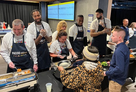 Pacers coaches, players, families and more helped serve individuals from local shelters.