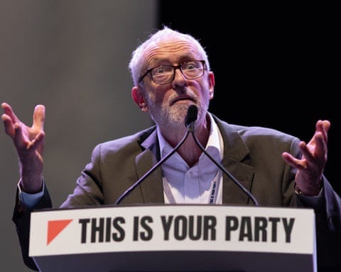 Jeremy Corbyn speaking at podium at Your Party conference in Liverpool.