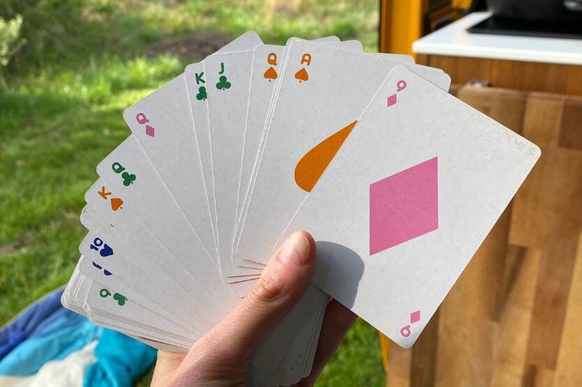 I hold a deck of cards spread out face up in the door of our converted camper van