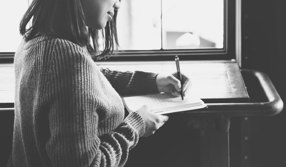 Woman editing in a coffeeshop