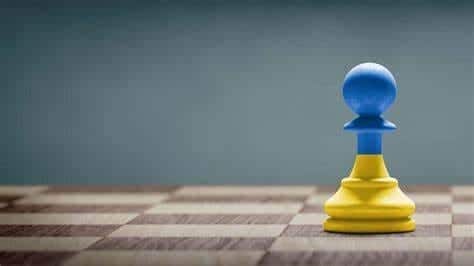 A chess piece on a chessboard

Description automatically generated