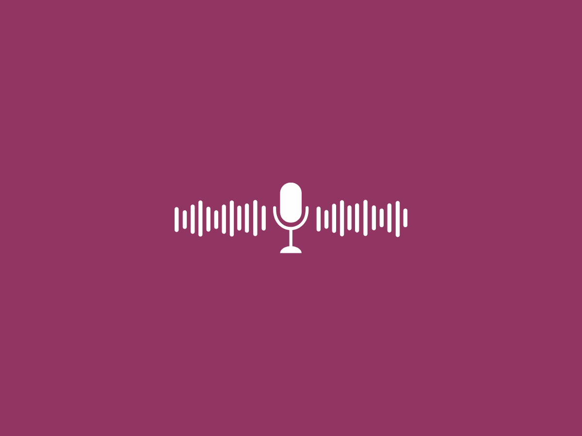 maroon background with a microphone in the middle