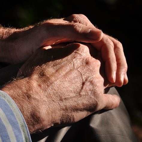 Triptych: Mens hands - Resting in lap, holding a child's hand, shucking oysters
