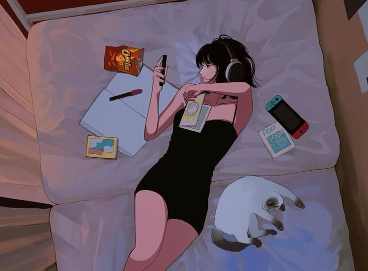 This may contain: a woman laying in bed with her headphones on, next to an electronic device