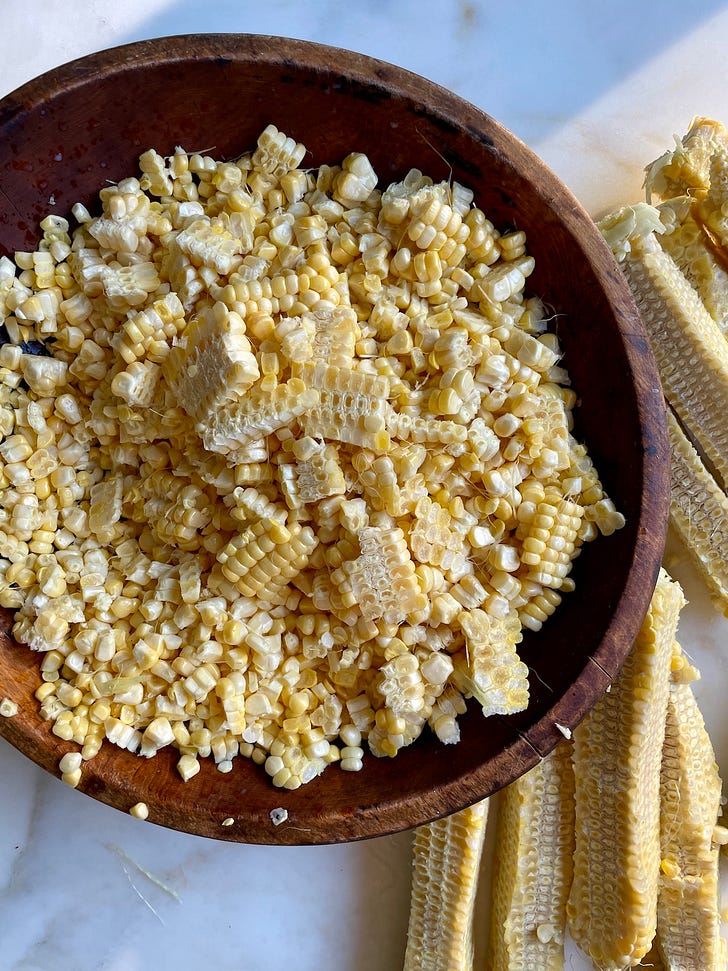 Mariana did say that you can use frozen corn, if needed, for this recipe — preferably white. I found local bicolor corn still in season.