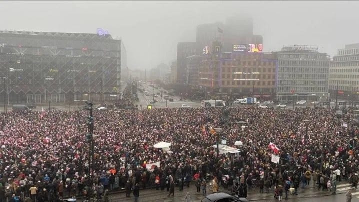 May be an image of crowd and text