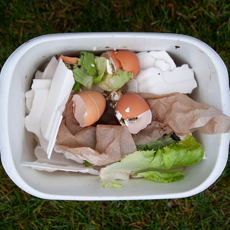 Triptych. Left and right a white rectangular bucket of compost; Central image is a bucket of leaves surrounded by seven buckets of compost.