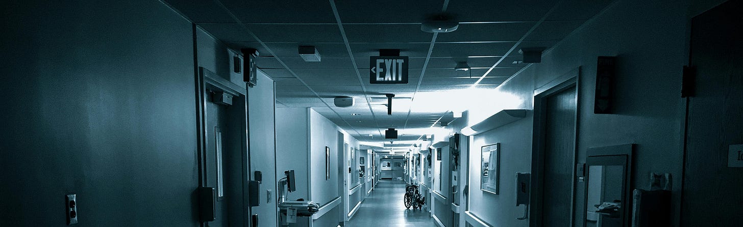 Empty long corridor of modern hospital · Free Stock Photo