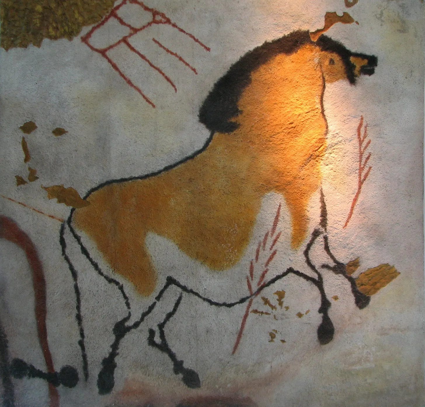 Prehistoric horse painted in orange ocher on a cave wall at Lascaux Prehistoric horse painted in orange ocher on a cave wall at Lascaux