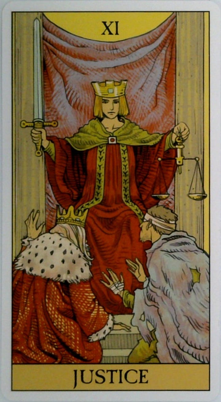 The Justice tarot card and the Emotions Are Energy in Motion oracle card.