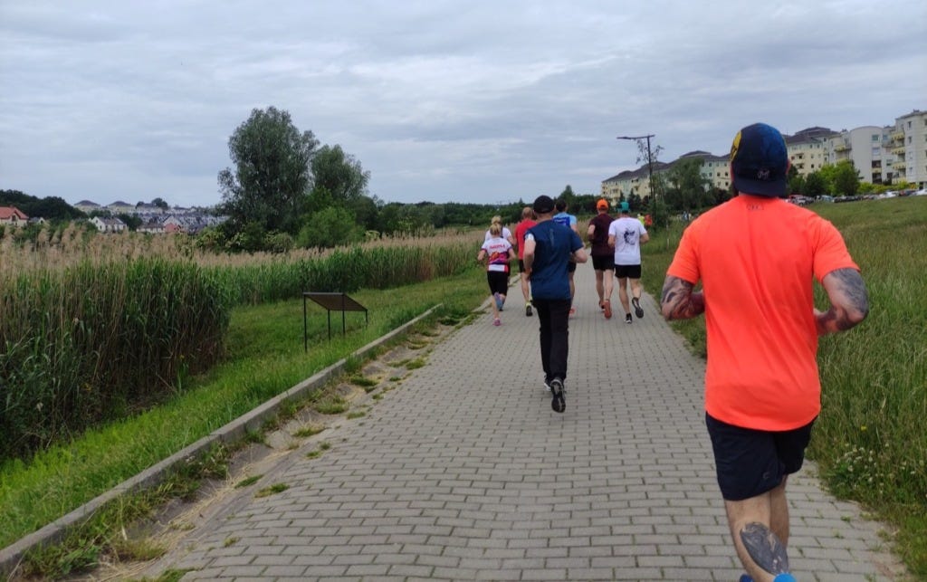 Runners on the brick-paved surface