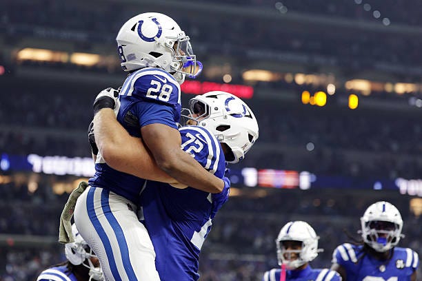 Jonathan Taylor and Braden Smith of the Indianapolis Colts celebrate after Taylor's rushing touchdown against the Tennessee Titans during the third... Jonathan Taylor and Braden Smith of the Indianapolis Colts celebrate after Taylor's rushing touchdown against the Tennessee Titans during the third...