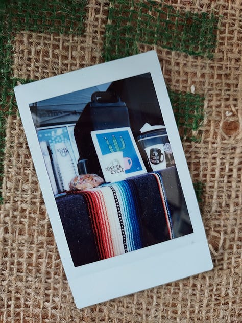 Instant photographs of coffee mugs.