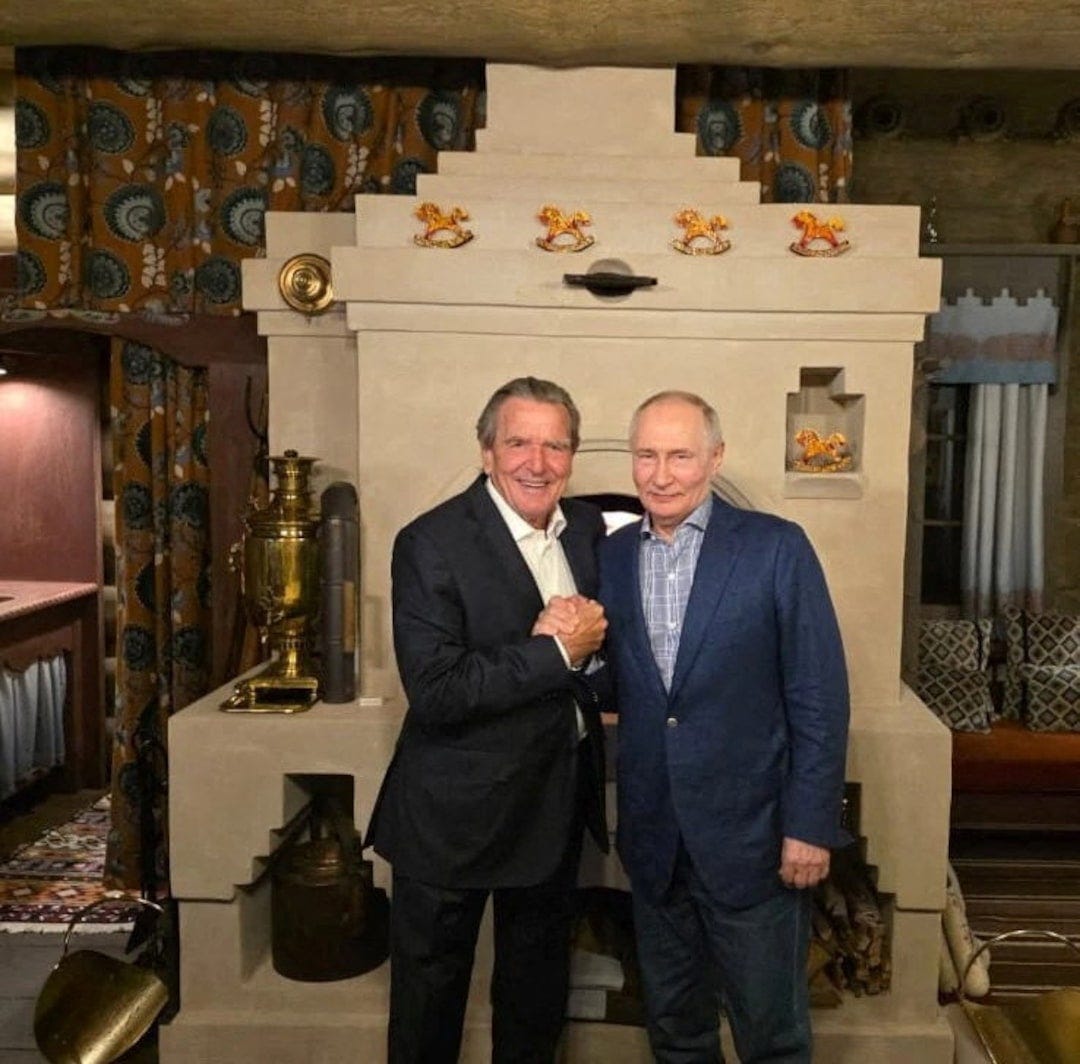 Meeting of Russian President Putin and former German Chancellor Schroeder