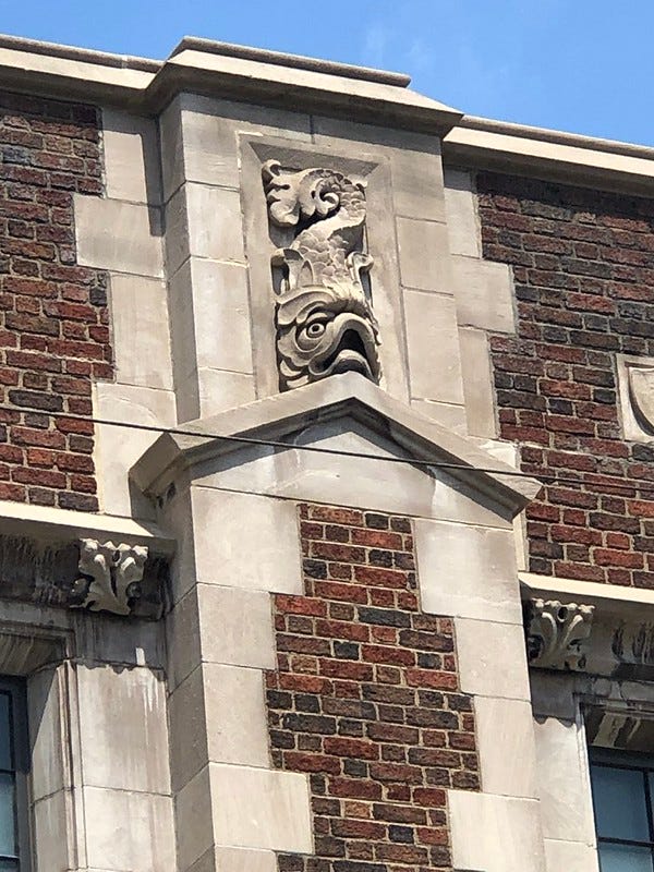 Fish detail carved into the building.