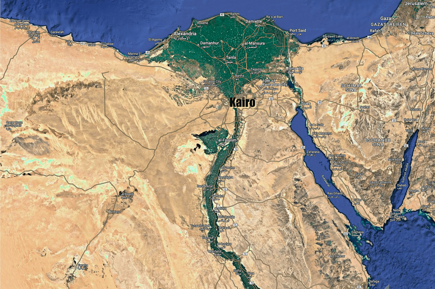 Das Bild zeigt eine Satellitenansicht von Ägypten mit dem schmalen «grünen Band» der landwirtschaftlich genutzten Fläche entlang des Nil-Ufers. Diese fruchtbare Zone zieht sich etwa 500 Kilometer von Luxor bis Kairo. Das grüne Band ist deutlich vom umgebenden Wüstengebiet abgegrenzt und stellt die Hauptanbaufläche für landwirtschaftliche Produkte in Ägypten dar. Das Bild zeigt eine Satellitenansicht von Ägypten mit dem schmalen «grünen Band» der landwirtschaftlich genutzten Fläche entlang des Nil-Ufers. Diese fruchtbare Zone zieht sich etwa 500 Kilometer von Luxor bis Kairo. Das grüne Band ist deutlich vom umgebenden Wüstengebiet abgegrenzt und stellt die Hauptanbaufläche für landwirtschaftliche Produkte in Ägypten dar.