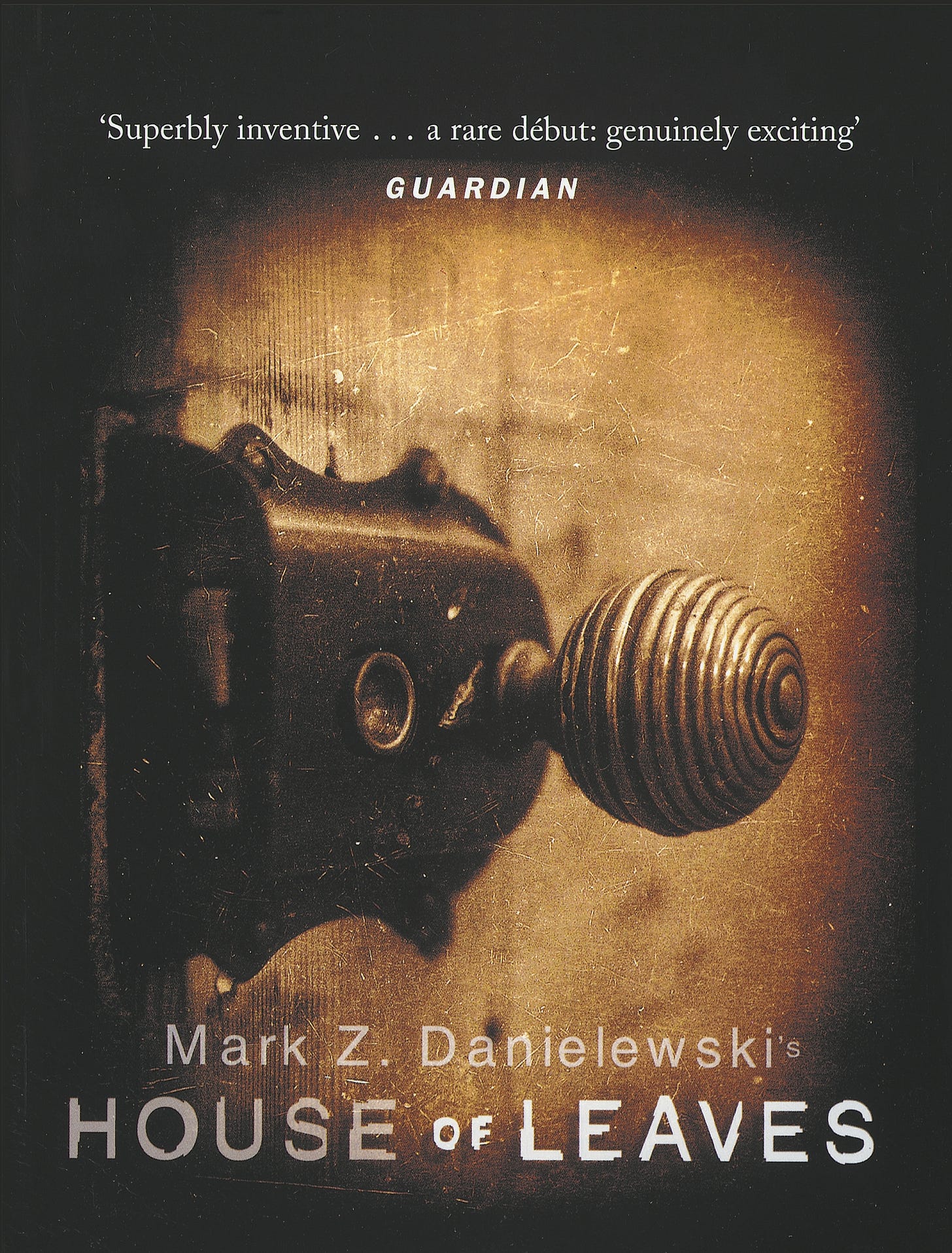 Cover image to House of Leaves - a doorknob and praise from the Guardian