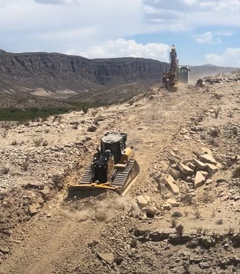 Federal contractors carve a path through Mariscal Mountain in Big Bend National Park. (Photo by Laiken Jordahl)