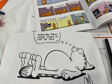 drawings of garfield the cat, from pencil, to ink, to color 