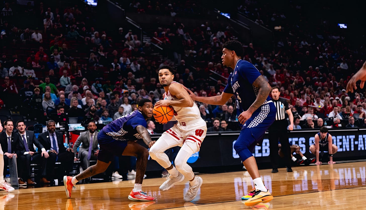 Nick Boyd drives to the basket for Wisconsin against High Point in an NCAA Tournament game.