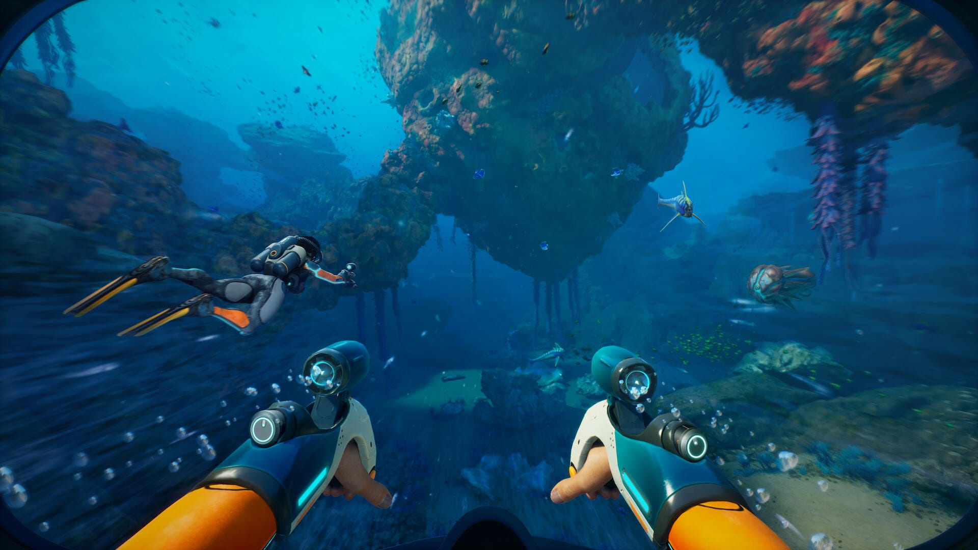 Video game screenshot that shows the first-person view of someone swimming underwater with propulsion gadgets attached to their hands. Another diver, in a full wetsuit, is off to the left