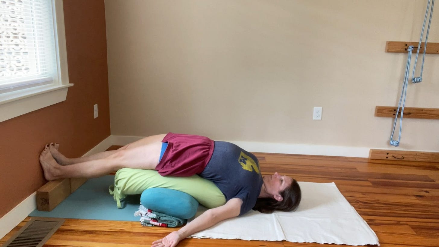 Cross bolsters Setu Bandha Sarvangasana