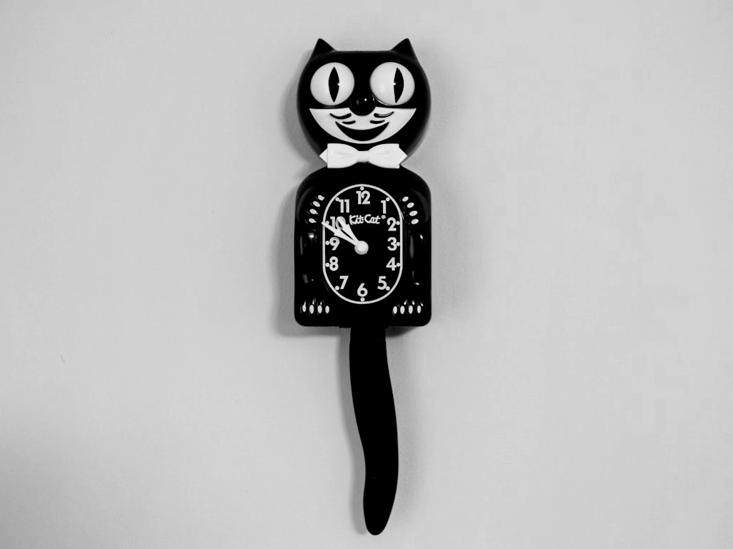 black and white panda analog wall clock