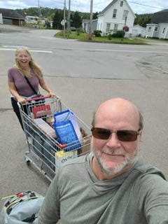 Saturday am cafe music in St. Peter’s, fireworks farewell, Kitchen Party, Flo Sampson and nephew, welcome banner, Barra Strait Bridge in Bras d’Or Lake, oatcakes from High Wheeler Cafe in Baddeck(recommend!), grocery portage.