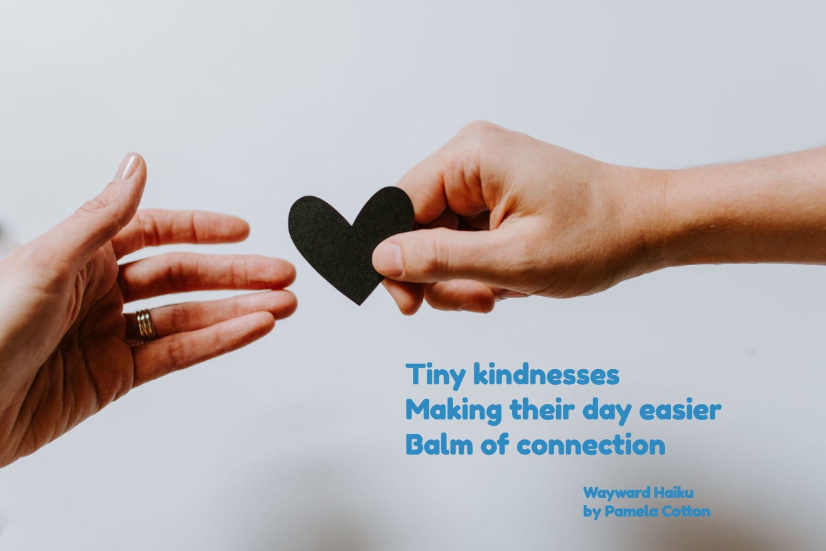 A picture of a hand from one person reaching out to a hand of aother person, offering to give a heart-shaped object to them.