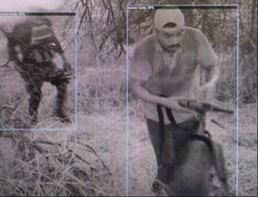 Image of armed Cartel gunmen photographed by Texas DPS surveillance camera on Fronton Island on August 5, 2022. (Image from Texas Department of Public Safety Surveillance Camera)