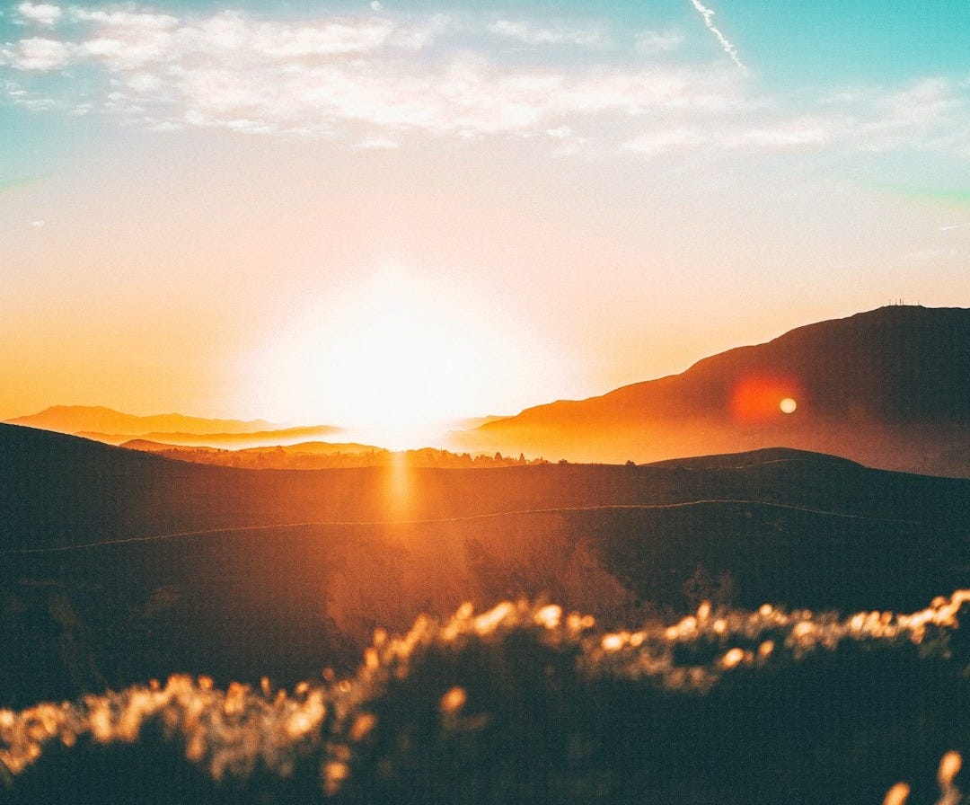 sunset over the horizon sunset over the horizon