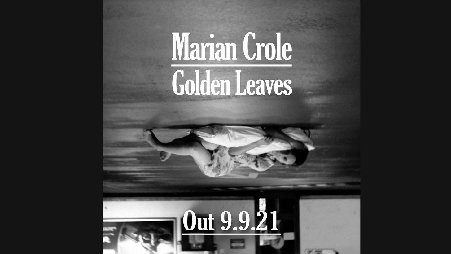 Puede ser una imagen en blanco y negro de texto que dice "Marian Crole Golden Leaves Out 9.9.21"