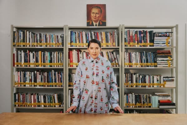 The performance artist Marina Abramović in the library of her expansive archive in upstate New York, which houses sculptural works, exhibition posters, press clippings and other ephemera from her storied career.
