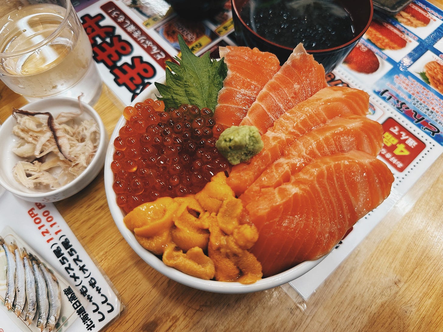 Uni, ikura, and salmon kaisendon at Takinami Shokudo in Otaru's Sankaku Market Uni, ikura, and salmon kaisendon at Takinami Shokudo in Otaru's Sankaku Market