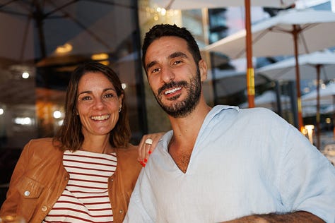 Group portraits of friends and their dogs in life jackets on a boat in Boston Harbor during summer outing