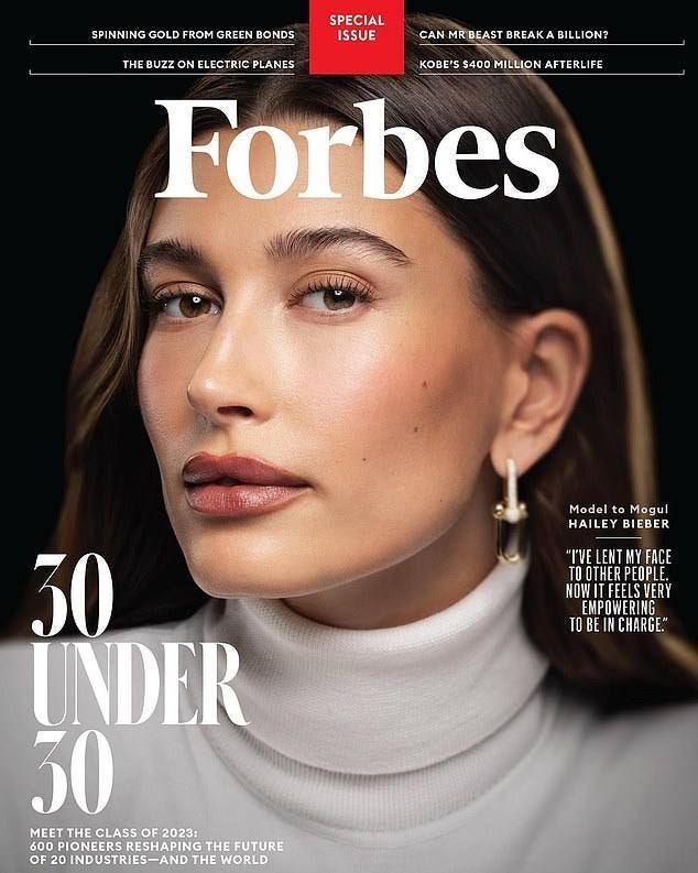 This may contain: a magazine cover with a woman wearing gold hoop earrings on the front and side of her face