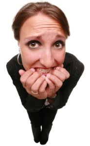 iStock_000003688168XSmallWorrySitFemale2