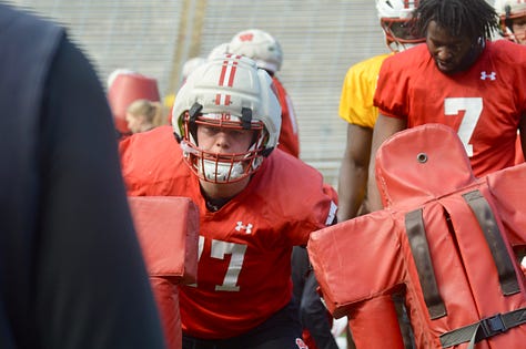 Wisconsin outside linebackers participate in individual position drills during the Badgers' spring football practice Saturday inside Camp Randall Stadium.